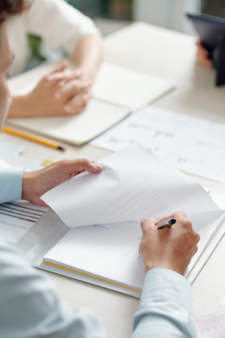 Entrepreneur signing documents